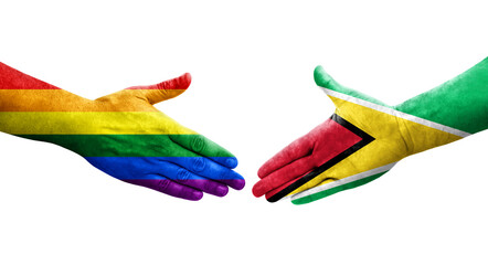 Handshake between Guyana and LGBT flags painted on hands, isolated transparent image.