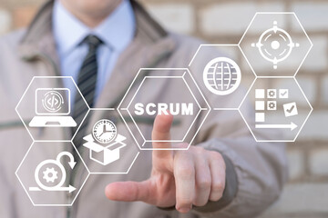 Man using virtual touchscreen presses word: SCRUM. Scrum software development concept. Scrum sprint...