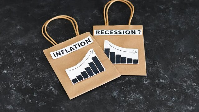 inflation and recession in economy, shopping bags with texts and graphs showing prices going up and growth going down