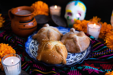 Hojaldra pan de muerto, Mexican bread on Altar with sugar skull and hot chocolate traditional food for Celebration of Mexico's Day of the Dead	
