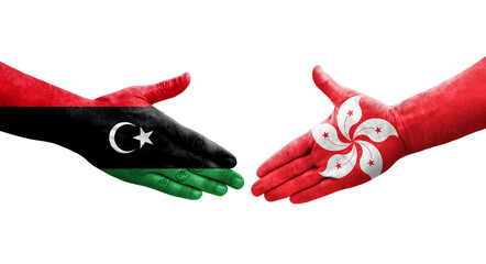 Handshake between Hong Kong and Libya flags painted on hands, isolated transparent image.