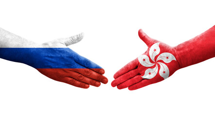 Handshake between Hong Kong and Russia flags painted on hands, isolated transparent image.