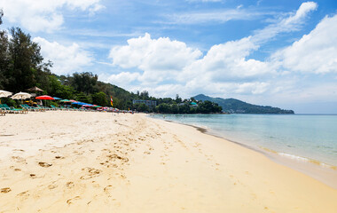 Tropical beach with colorful beach umbrella and chair in south of Thailand, summer season holiday, outdoor day light