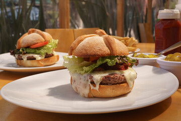 delicious hamburger with bread in the shape of mexican bread of the dead to celebrate the day of the dead
