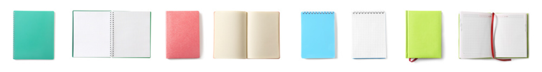 Collection of notebooks on white background