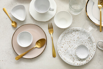 Many different tableware on white background, top view