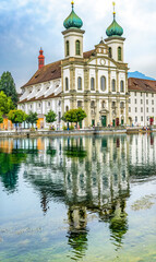 Fototapeta na wymiar Jesuit Church Inner Harbor Reflection Lucerne Switzerland