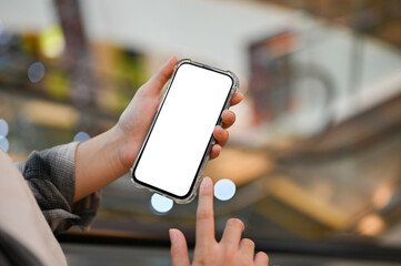 Close-up, A female using her smartphone in the shopping mall. smartphone mockup
