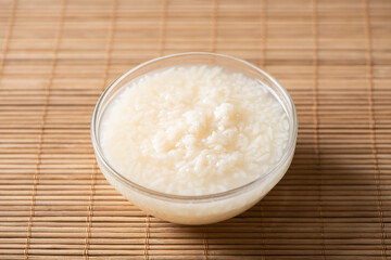 Delicious fermented glutinous rice wine on table