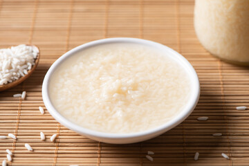 Delicious fermented glutinous rice wine on table