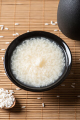 Delicious fermented glutinous rice wine on table