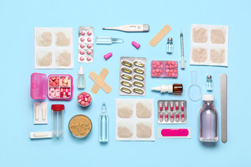 Mustard plasters with medicines on blue background