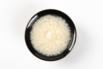 traditional fermented glutinous rice wine on white background