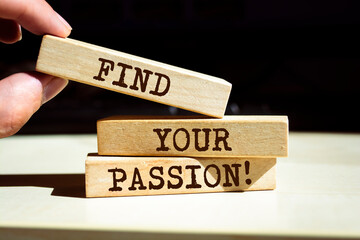 Wooden blocks with words 'Find your Passion'.