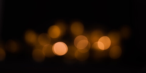 Glowing abstract background, Warm  lights on a black background