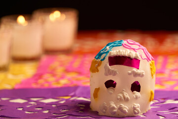 Sugar skull with Candles, Decoration traditionally used in altars for the celebration of the day of the dead in Mexico