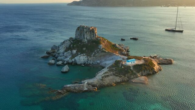 Kos island in Greece sunset aerial view, holiday Greek beach of Agios Stefanos on Kos island, vacation in Southern Europe