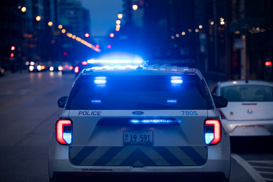 Chicago, Illinois, USA - March 29, 2022: Chicago Police Department officers respond to the scene of an incident.