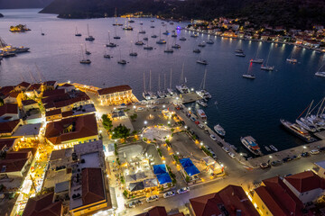 Fototapeta premium Panoramic view during sunset of the picturesque village Vathy the capital of Ithaca island, Ionian, Greece