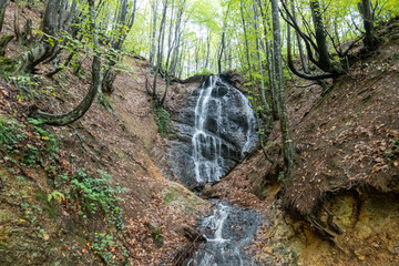 Autumn colors in stunning waterfall. Nature landscape in the the forest. October 2022 view in nature. Erikli waterfall, Yalova, Turkey.