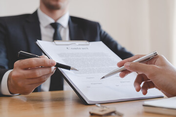 Financial, asian man lease landlord, agent banker or bonding hand is pointing to contract of...