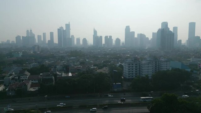 Housing with silhouette of cityscape at morning