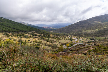 Naklejka premium views of The Royal Seat of San Lorenzo de El Escorial from the port of the green cross