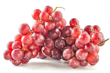 Red grapes on white marble, ready to cook and eat