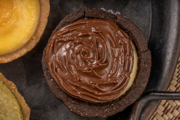 Egg Tart or Baked Cheese Tart in various flavors chocolate, cream.