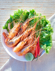 Seafood food in white bowl, shrimp, squid, shellfish