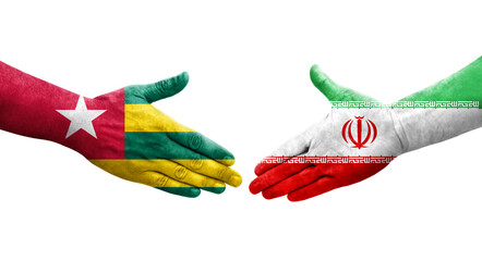 Handshake between Iran and Togo flags painted on hands, isolated transparent image.