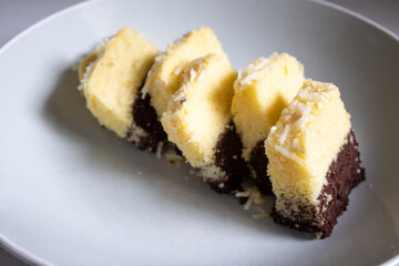 sweet vanilla and chocolate cake with cheese topping. looks so delicious