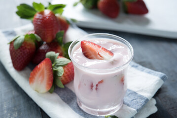 Healthy food of yogurt, Strawberry Yogurt,yogurt with fresh strawberry, wood background