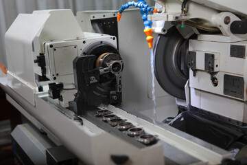 A machine for processing bearings. Production of bearings. Photos without people in a real factory. Heavy industry.