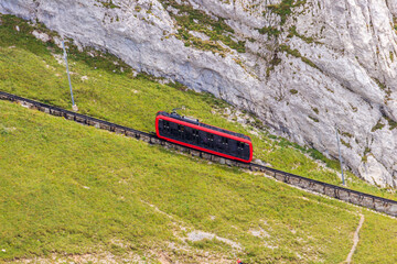 Cogwheel train climbing to the top of Mount Pilatus in Canton Lucerne, Switzerland. World's...