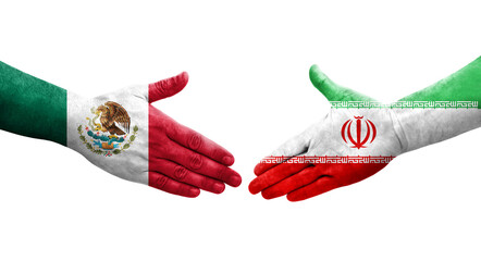 Handshake between Iran and Mexico flags painted on hands, isolated transparent image.