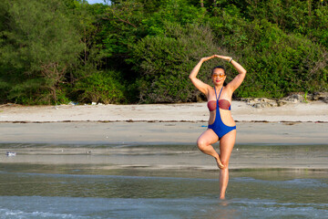 Fototapeta premium Woman with swimsuit sexy with sunshine at beach