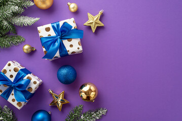 Christmas celebration concept. Top view photo of stylish gift boxes with ribbon bows blue and gold baubles star ornaments and pine branches in snow on isolated violet background with copyspace