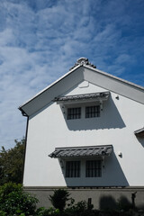Fototapeta na wymiar Aichi, Japan - September 10 2022: Scenery of buildings at Inuyama Castle area, national historic site at summer with blue sky background.