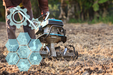Tractor cultivating field at spring with Smart agriculture farming AOT Increase agricultural productivity concept.