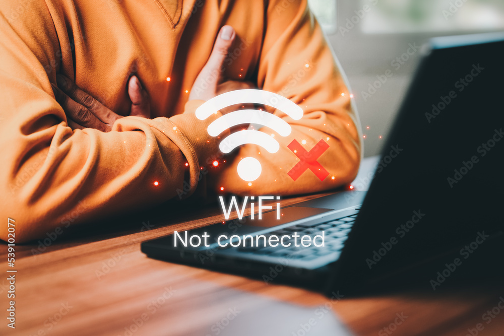 Poster Man using a computer laptop to connect to wifi but wifi not connected, and waiting to loading digital business data form website, concept technology of waiting for connect to wifi.