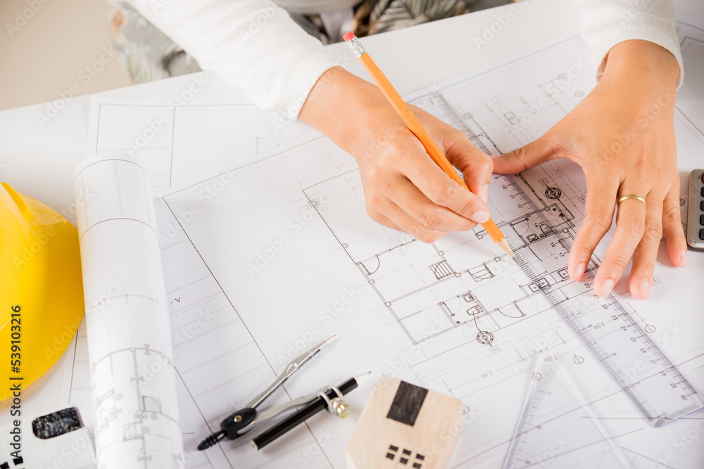 Poster architectural project workspace. top view of architect drawing with ruler on house plan blueprint pa