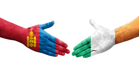 Handshake between Ireland and Mongolia flags painted on hands, isolated transparent image.