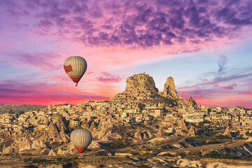 Hot Balloon over morning Uchisar in Turkey