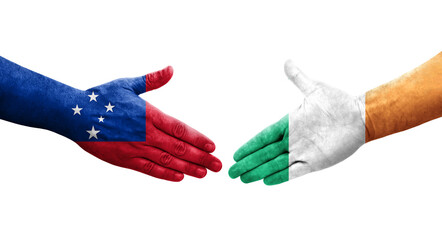 Handshake between Ireland and Samoa flags painted on hands, isolated transparent image.