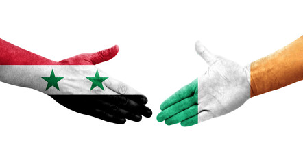 Handshake between Ireland and Syria flags painted on hands, isolated transparent image.