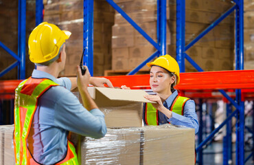 Workers team working in warehouse, Manager and supervisor taking inventory in warehouse, Female foreperson making plans with warehousemen