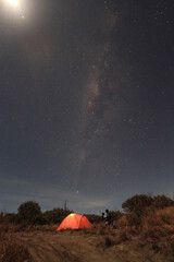 High iso image of tent and milkyway trail with  grained picture under the star . Night shots photography