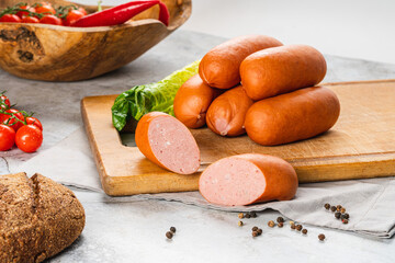 boiled sausages on a bright kitchen table