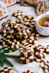 Fototapeta na wymiar Christmas Chessboard cookies in christmas background